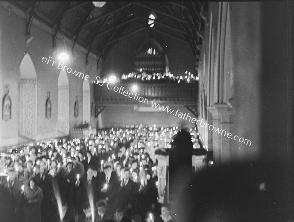 CHURCH INTERIOR CANDLE -LIT CLOSING OF MISSION